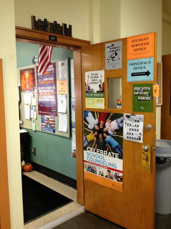Open counselors door decorated with posters and information